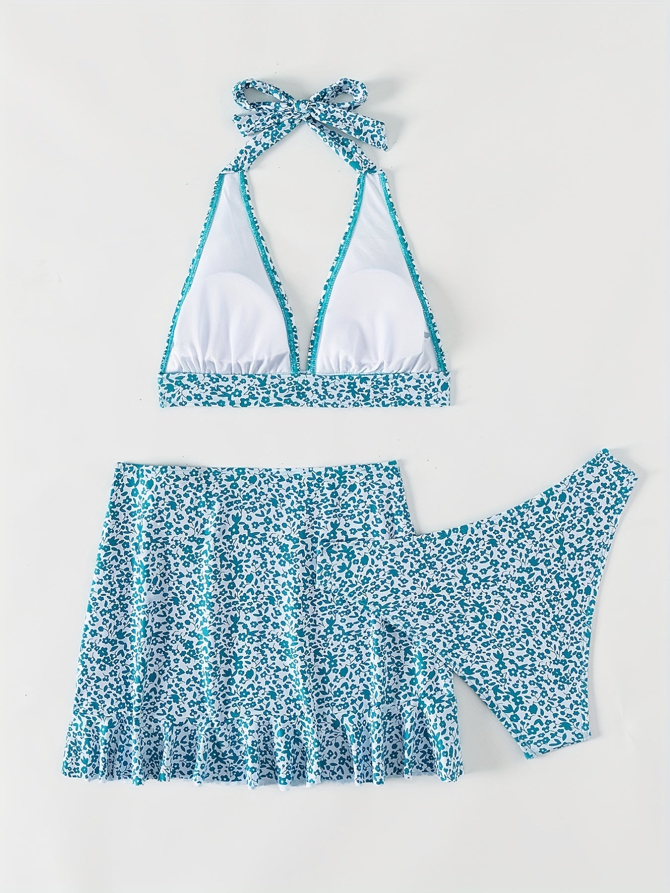 3-Piece Blue Ditsy Floral Halter Swimsuit Set – Chic Tie Neck Backless Bikini with Low Waist & Coordinating Stretch Wrap Skirt – Stylish Beachwear for Women