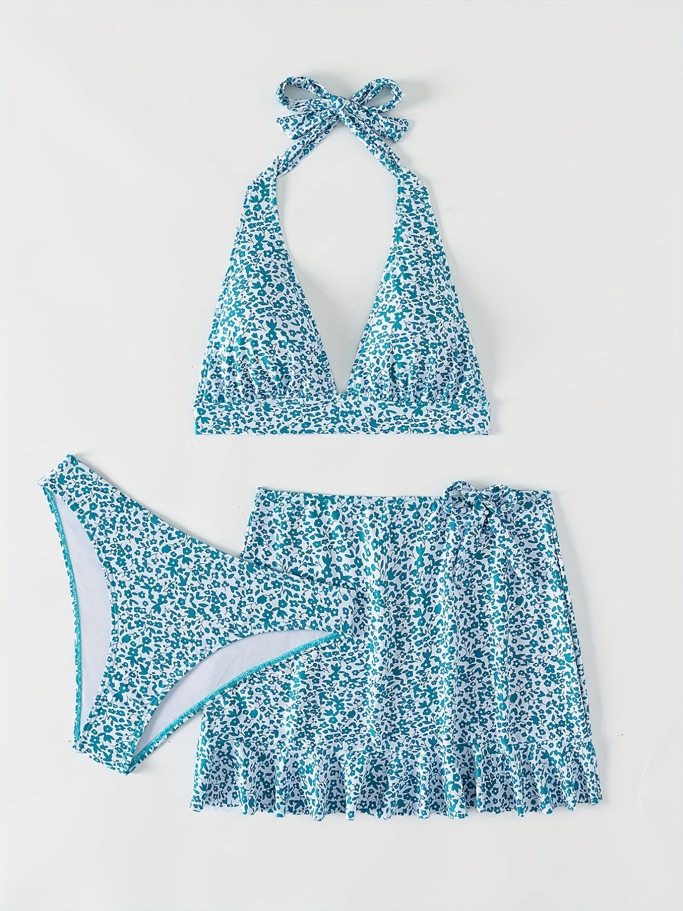 3-Piece Blue Ditsy Floral Halter Swimsuit Set – Chic Tie Neck Backless Bikini with Low Waist & Coordinating Stretch Wrap Skirt – Stylish Beachwear for Women