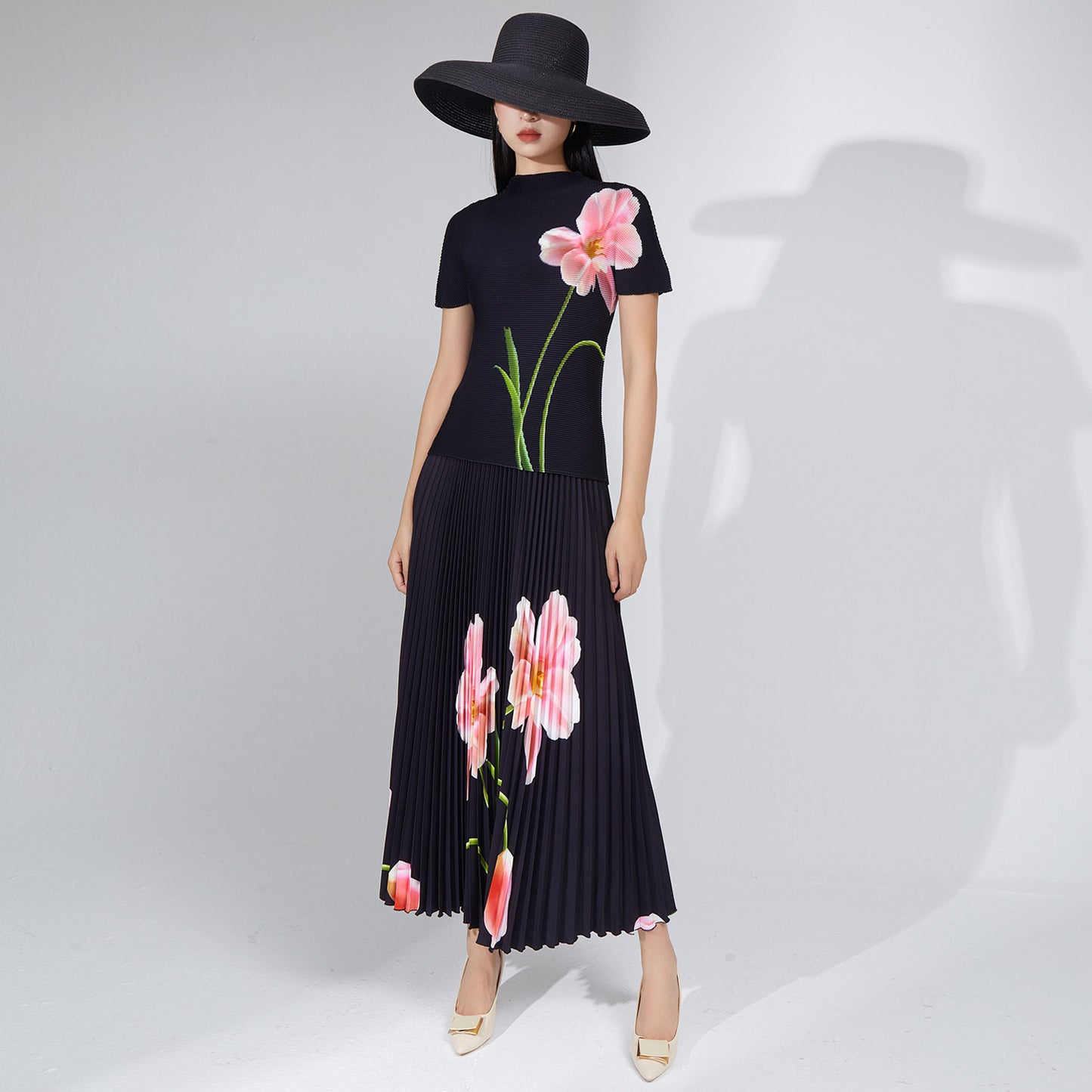 2025 Popular trade explosive suit women's clothing summer new printed T-shirt top short-sleeved long skirt two-piece set