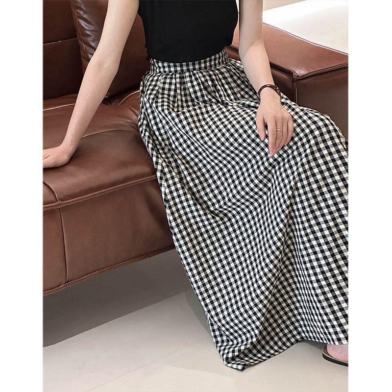 2025 Tachibana popular early autumn new black and white plaid half skirt loose and thin high waist A character temperament long skirt 1599