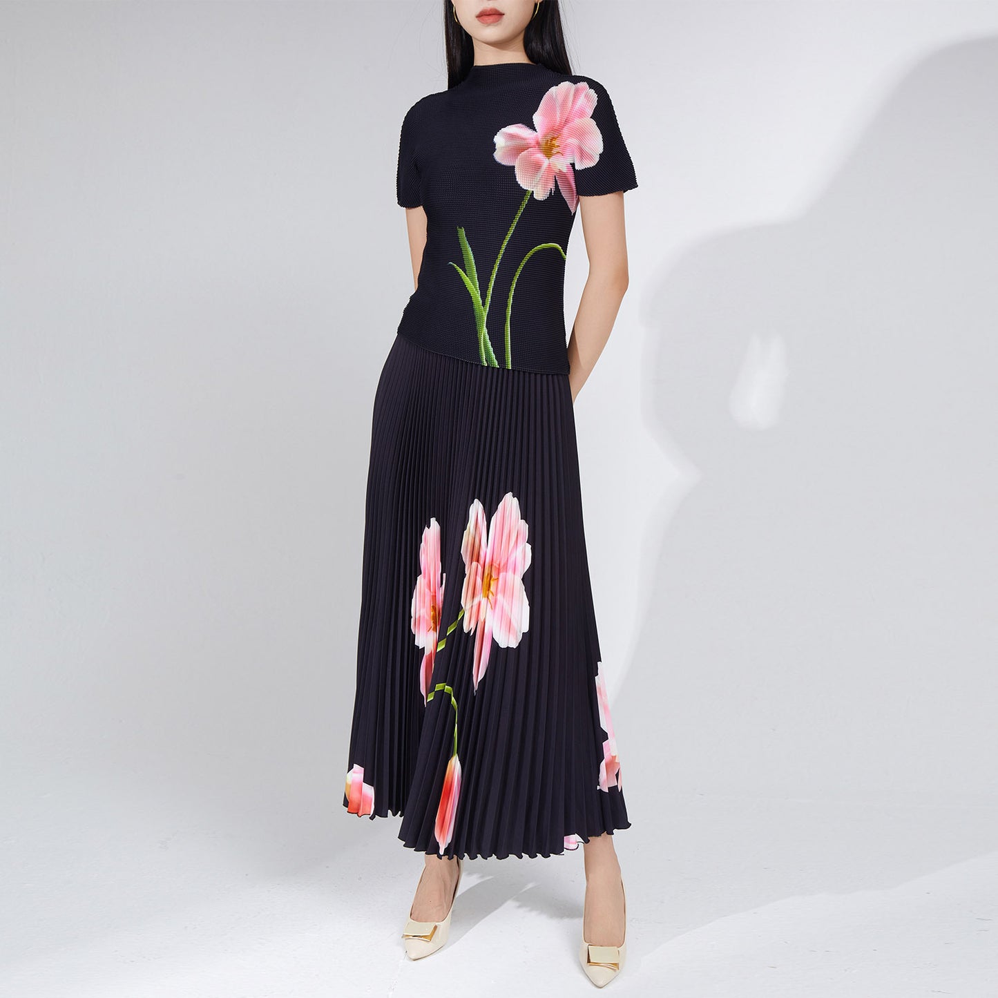 2025 Popular trade explosive suit women's clothing summer new printed T-shirt top short-sleeved long skirt two-piece set