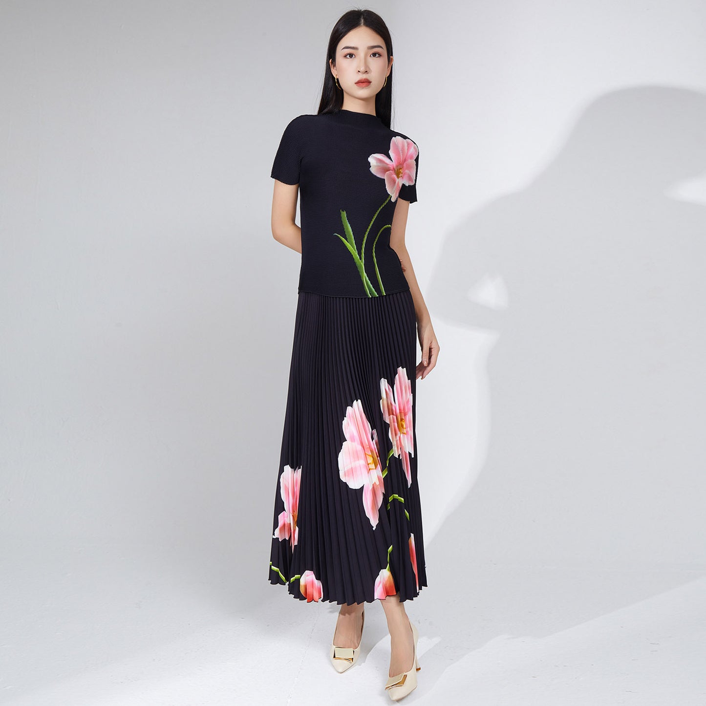 2025 Popular trade explosive suit women's clothing summer new printed T-shirt top short-sleeved long skirt two-piece set
