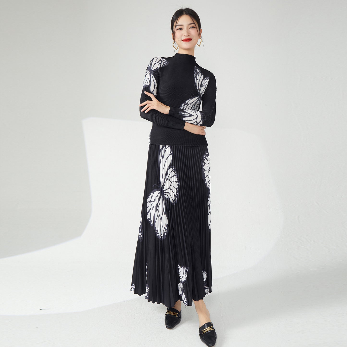 2025 Nanyou high-end women's clothing pleated printing pleated skirt two-piece women's clothing black slim butterfly temperament suit