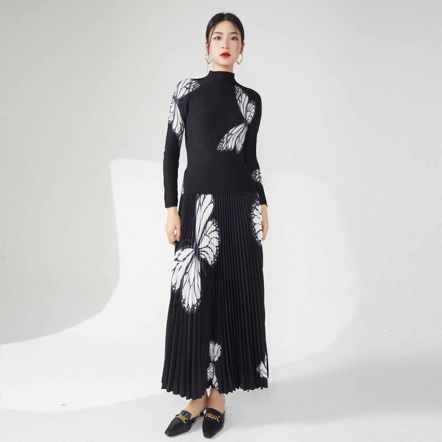 2025 Nanyou high-end women's clothing pleated printing pleated skirt two-piece women's clothing black slim butterfly temperament suit