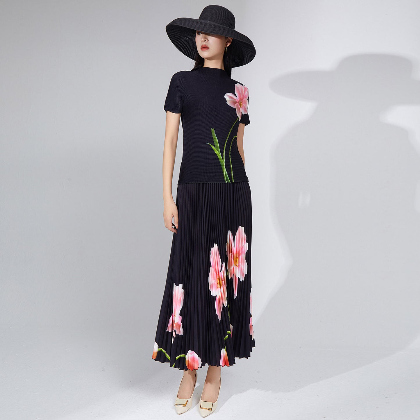 2025 Popular trade explosive suit women's clothing summer new printed T-shirt top short-sleeved long skirt two-piece set