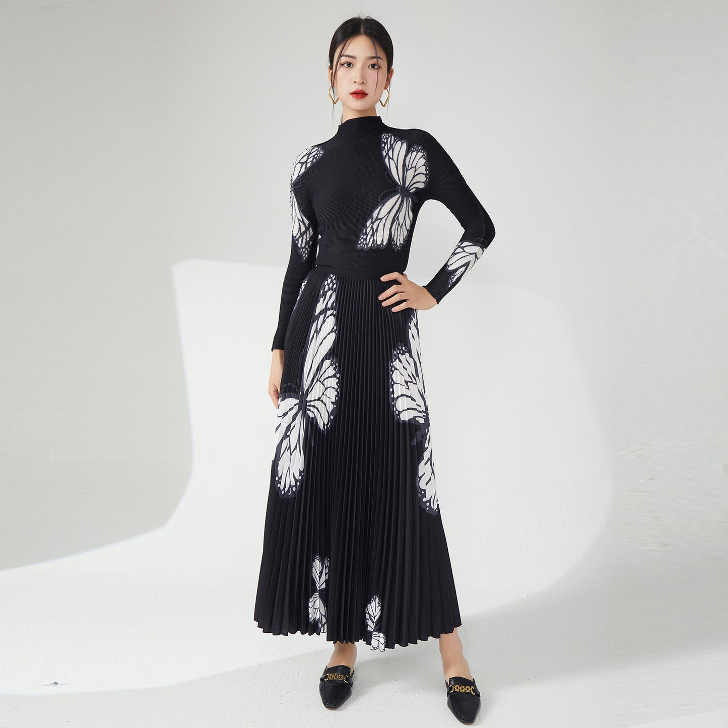 2025 Nanyou high-end women's clothing pleated printing pleated skirt two-piece women's clothing black slim butterfly temperament suit