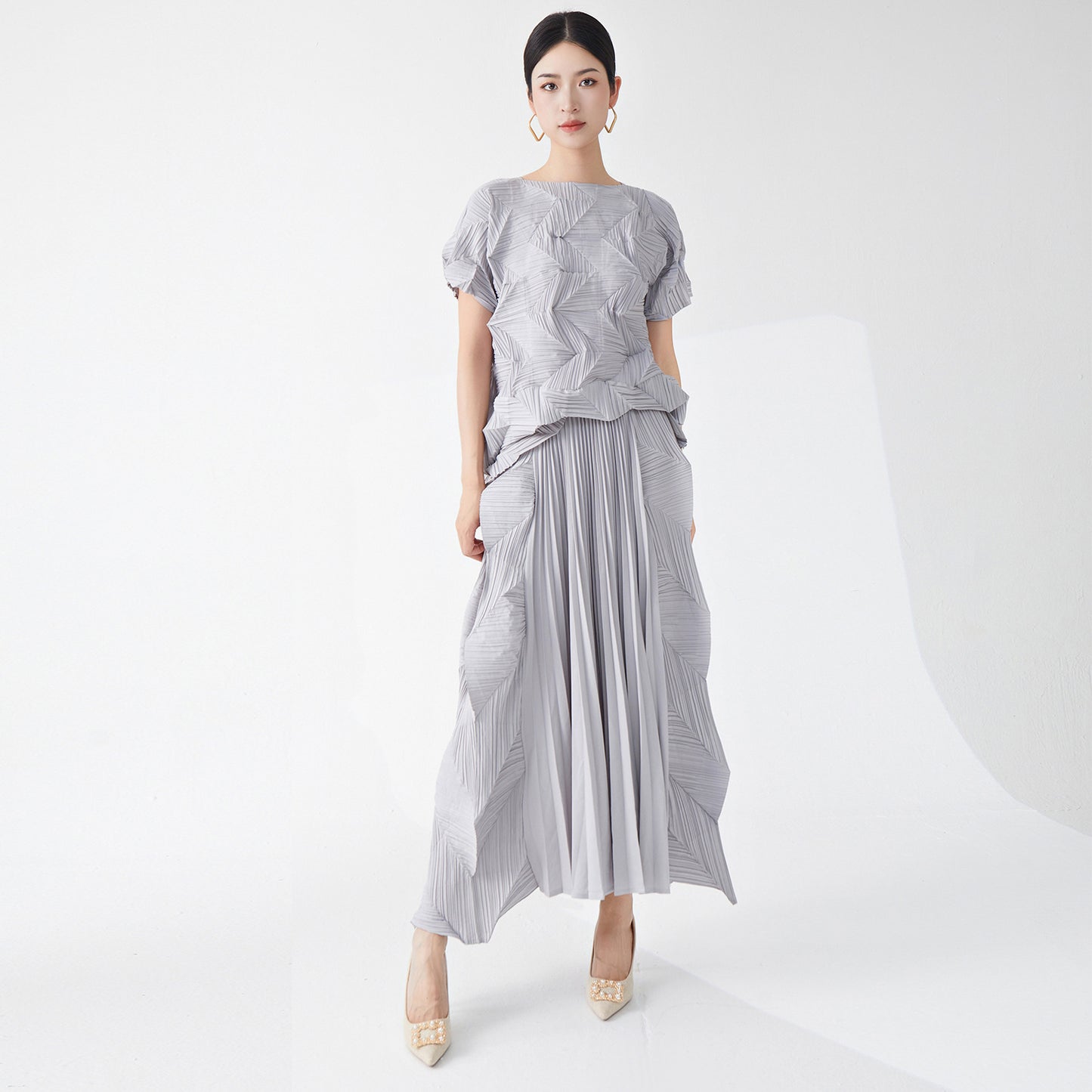 2025 Hot-selling women's suit summer two-piece set high-end irregular casual T-shirt short-sleeved top versatile skirt