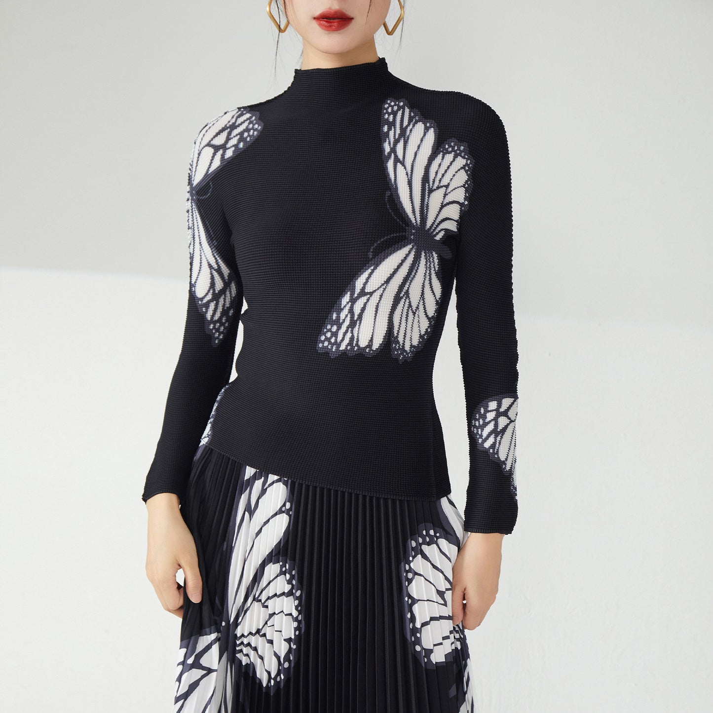 2025 Nanyou high-end women's clothing pleated printing pleated skirt two-piece women's clothing black slim butterfly temperament suit