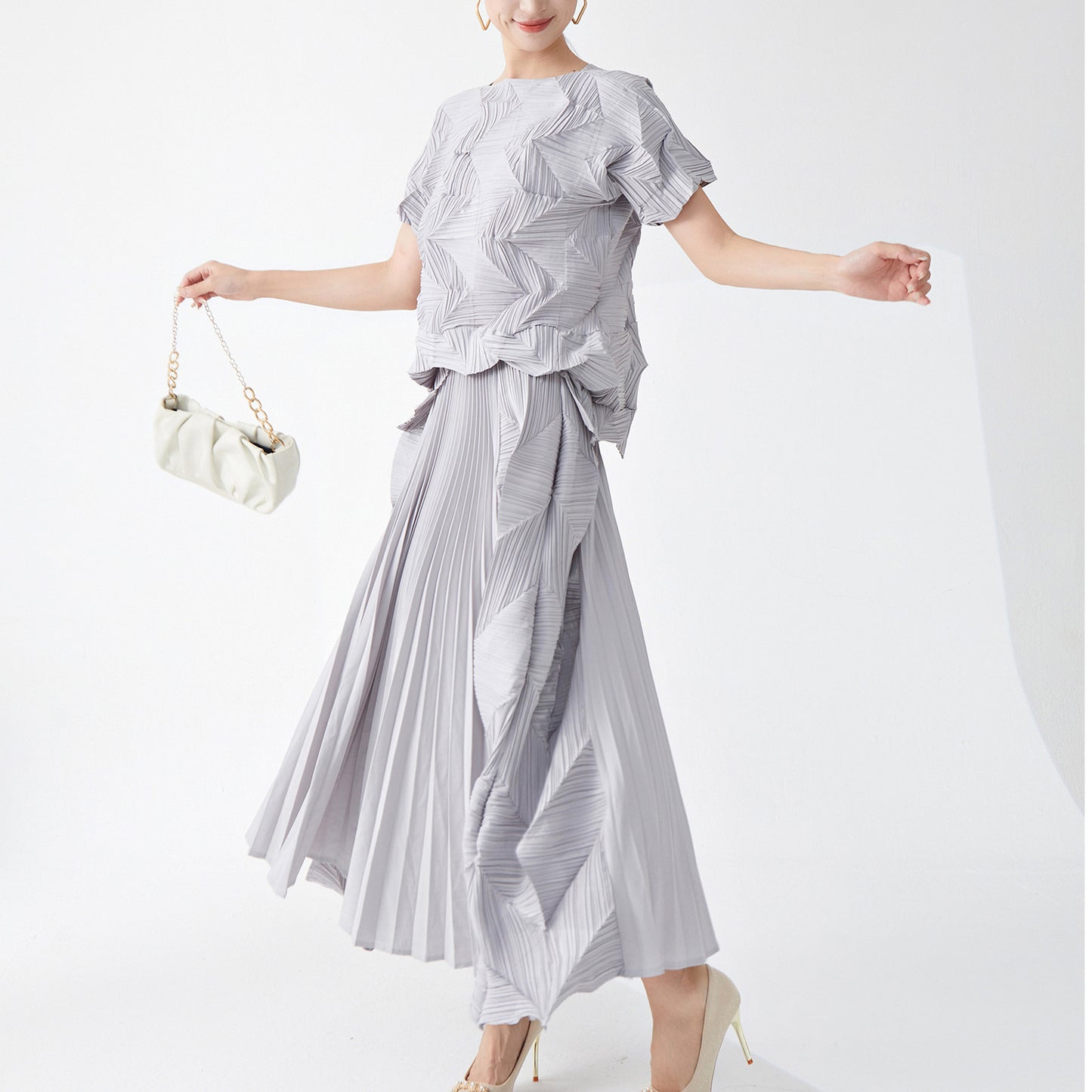 2025 Hot-selling women's suit summer two-piece set high-end irregular casual T-shirt short-sleeved top versatile skirt