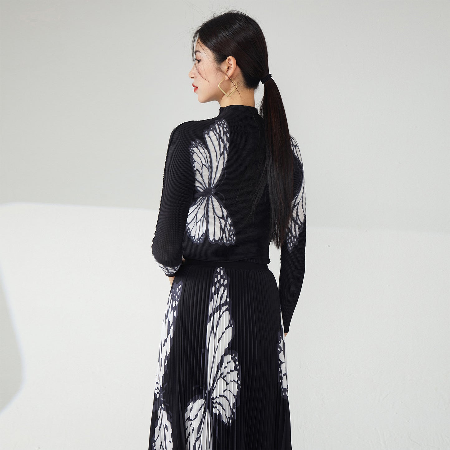 2025 Nanyou high-end women's clothing pleated printing pleated skirt two-piece women's clothing black slim butterfly temperament suit