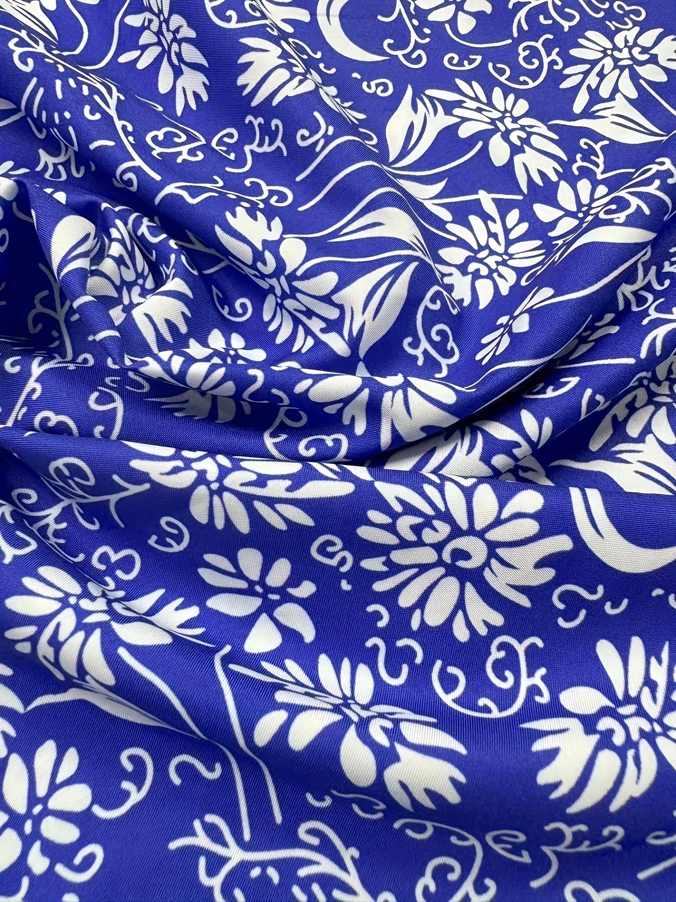 Plus Size Elegant Skirt, Women's Plus Floral Print Knot Front Elastic High Rise Asymmetric Hem Swing Maxi Skirt