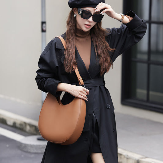 VLOVELAW 2025 popular new niche design special-shaped crescent bag, semi-round bag, one-shoulder underarm women's bag, leather messenger tote bag.
