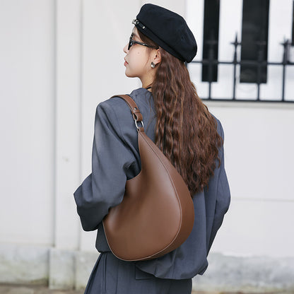 VLOVELAW 2025 popular new niche design special-shaped crescent bag, semi-round bag, one-shoulder underarm women's bag, leather messenger tote bag.