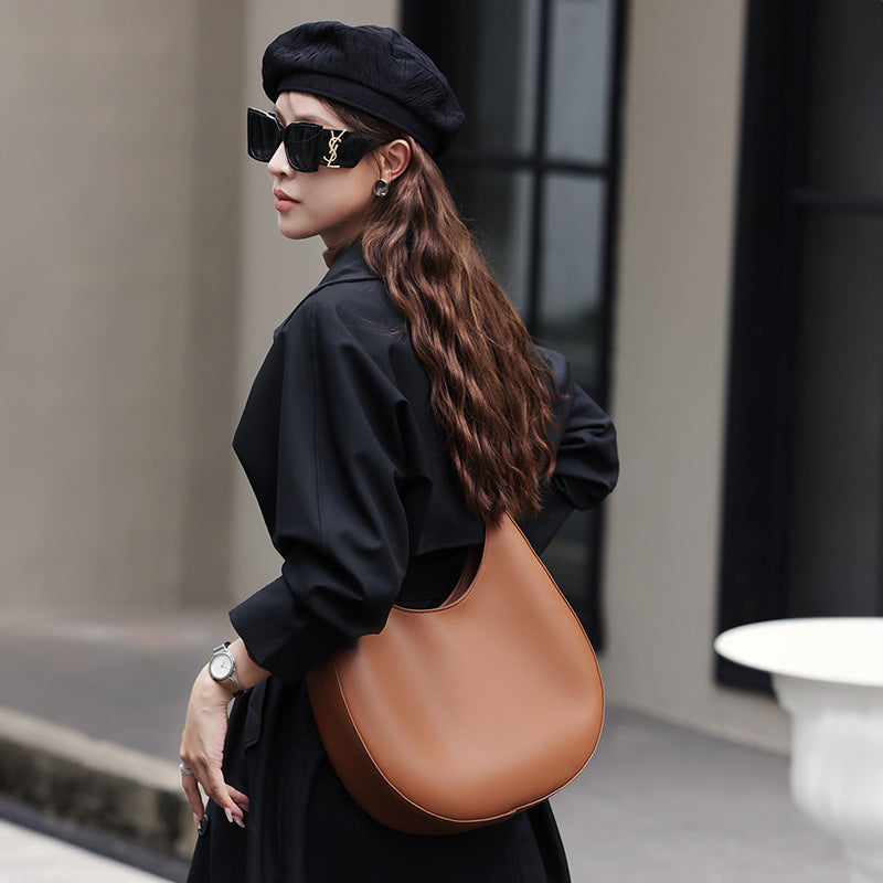 VLOVELAW 2025 popular new niche design special-shaped crescent bag, semi-round bag, one-shoulder underarm women's bag, leather messenger tote bag.